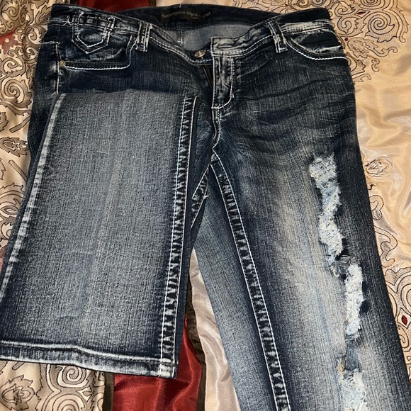 Dark, denim blue jeans with rips. Nice fit and true to size. - Picture 3 of 3